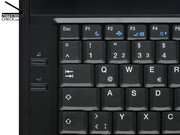 The top-most of the two hot keys on the right side is for faster battery recharging. The one below powers the high-power USB ports even if the notebook is turned off.