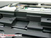 SIM card slot located beneath the battery compartment