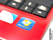 The small "name badge" is located directly above the keyboard The small "name badge" is located directly above the keyboard