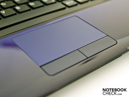 The touchpad is of sufficient size and features a lightly buffed surface.