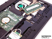 An unoccupied Mini PCI Express slot is found beside the RAM and hard disk. An unoccupied Mini PCI Express slot is found beside the RAM and hard disk.