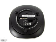 The speaker is connected via a stereo-mini cord.