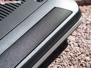 The speakers are on the front behind the perforated grille.