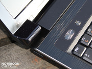 There are plastic lined hinges and a work surface made of cool, grippy, brushed aluminum. There are plastic lined hinges and a work surface made of cool, grippy, brushed aluminum.