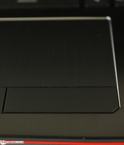 Brushed aluminum touchpad with chrome perimeter