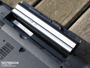 The battery is removed in a rocking motion The battery is removed in a rocking motion