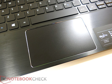 Touchpad with integrated button