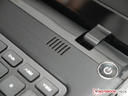The stereo speakers are located above the keyboard.