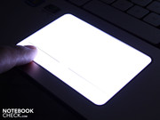 It lights both key areas when touched (glowing touchpad). It lights both key areas when touched (glowing touchpad).