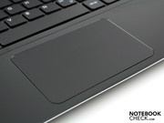 The very large mouse pad can be pressed on its surface for a click (like Apple's).