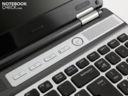 The silver bar has hot keys for volume, mute and WLAN/Bluetooth. The silver bar has hot keys for volume, mute and WLAN/Bluetooth.