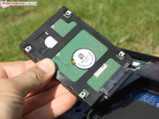 A rubber cage protects the hard disk against shocks to an extent.