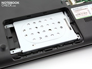 The panel for the RAM compartment has a shield made of silver metal. The panel for the RAM compartment has a shield made of silver metal.