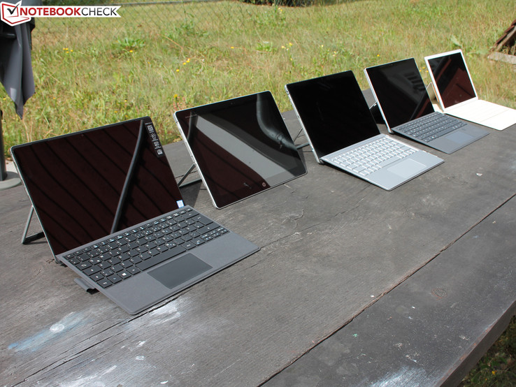 Five strong competitors; which one is best? Switch Alpha 12, Elite x2 1012, Spectre x2 12, Surface Pro 4, Huawei MateBook (right to left)