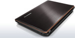 The brushed-metal lid of the Y570 features a curious maze-like dot pattern. (courtesy Lenovo, Inc.)