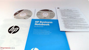 The laptop comes with two DVDs (Windows 8 Pro, Application and Driver Recovery) and a few leaflets.