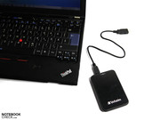 even beside the small ThinkPad X220, the drive appears to be tiny