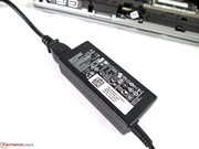 The power supply is rated at 65 W. The power supply is rated at 65 W.