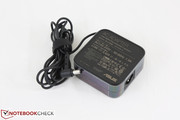 Small AC adapter (7.5 x 7.5 x 3.0 cm) outputs 19 Volts