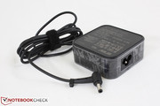 Small (7.5 x 7.5 x 3.0 cm) AC adapter outputs 19 V