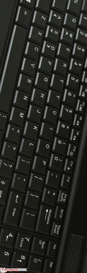 Beveled keyboard with quiet keys and adequate travel