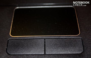 The touchpad has a silver plastic frame... The touchpad has a silver plastic frame...