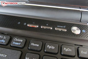 Two speakers are placed next to the power button. Two speakers are placed next to the power button.