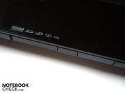 There is a card reader and an infrared receiver stationed on the front of the laptop There is a card reader and an infrared receiver stationed on the front of the laptop