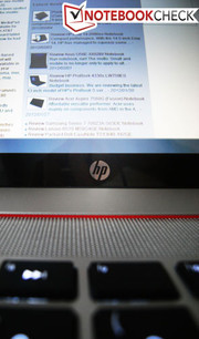 A red stripe accents the recessed keyboard area A red stripe accents the recessed keyboard area
