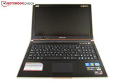 Both hands are required to open the laptop. Both hands are required to open the laptop.