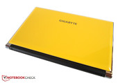 The yellow cover is made of glossy synthetic material. The yellow cover is made of glossy synthetic material.
