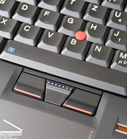 A true Thinkpad also has a red trackpoint between its black keys as an additional mouse replacement beside the touchpad.