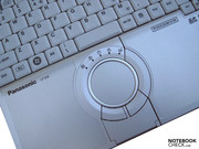 ... a round touchpad with...