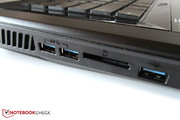 The card reader is surrounded by three USB 3.0 ports. The card reader is surrounded by three USB 3.0 ports.