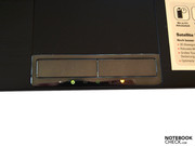 Status LEDs in the chrome-colored bezel of the comfortable but somewhat loud touchpad buttons.