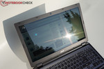 Low brightness and reflective surfaces lead to poor readability outdoors.