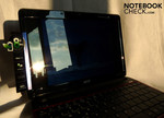 Unfortunately the 1810TZ's glossy display produces reflections. Unfortunately the 1810TZ's glossy display produces reflections.
