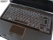 Two speakers are placed above the keyboard.