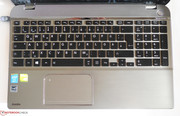 The keyboard layout and the small space bar take some time getting used to, ...