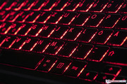 The keyboard features a red backlight.