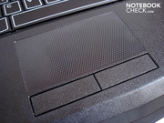 A delicate honeycomb pattern adorns the well-dimensioned touchpad.