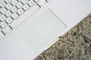 The mouse button is the trackpad itself, as before.