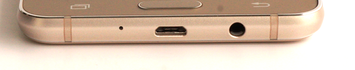 Lower edge: USB port, 3.5 mm headset jack