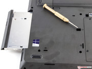 You can replace the optical drive without opening the case.