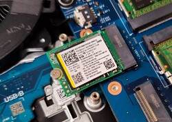 The SSTC CL4 M.2 2242 NVMe SSD with cover removed
