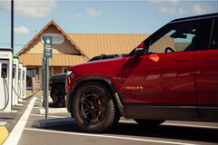 Rivian's R1S electric SUV is now capable of delivering 400 miles of range on a single charge, but it means drivers will have to spend more time charging. (Image source: Rivian)