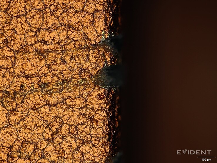 Image showing just what those scratches look like under a digital microscope (Image Source: iFixit)