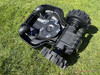 Underside of the robotic lawnmower with four wheels