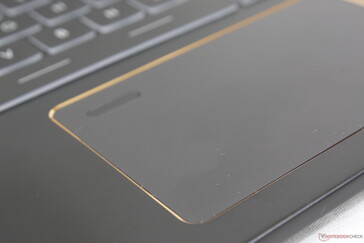 Clickpad surface is smooth and texture-less in contrast to the slightly roughened keyboard deck