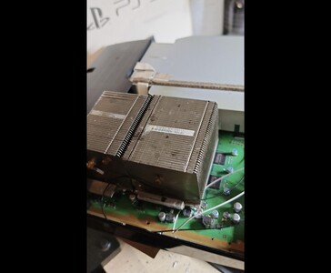 PS3 Slim Pro’s motherboard showing a large Dell server heatsink mounted onto the board. (Image source: Fun-Equivalent-7785 via Reddit / r/PS3)